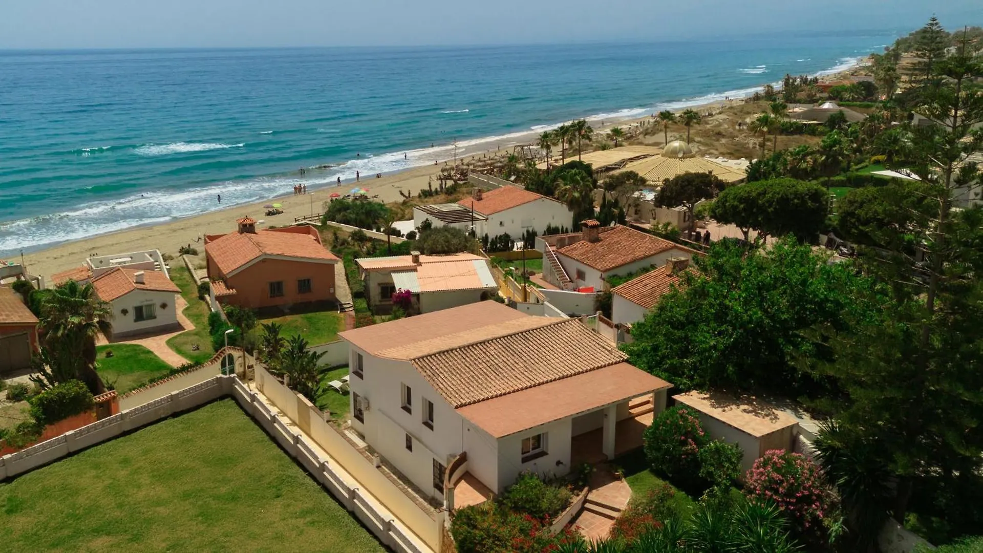 In The Second Line, Modern Beachfront Holiday Home In Costabella, Marbella